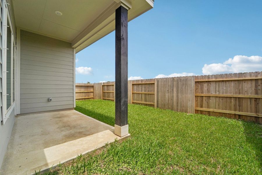 Exterior details and patio area of a home in Aldeana - Tejas Collection, Bonney (Image 4).