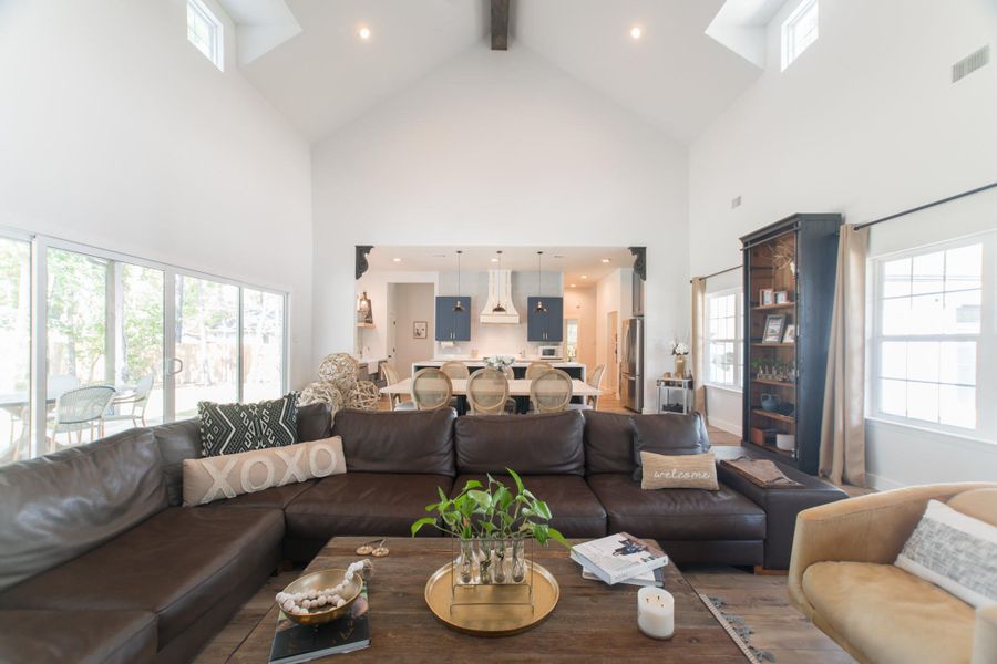The open floor plan, combined with the expansive living and dining areas, is beautifully complemented by the light and airy finishes throughout. The open floor plan, combined with the expansive living and dining areas, is beautifully complemented by the light and airy finishes throughout.