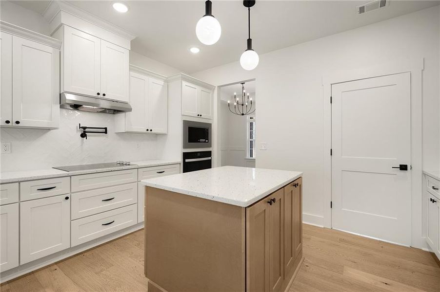 Furnished interior view inside a new home in , White (Image 10).