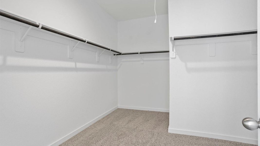 Spacious, unfurnished interior of a new home in Caldwell Crossing, Iowa Colony (Image 14).