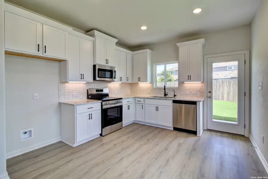 Furnished interior view inside a new home in Casinas at Gruene, New Braunfels (Image 7).
