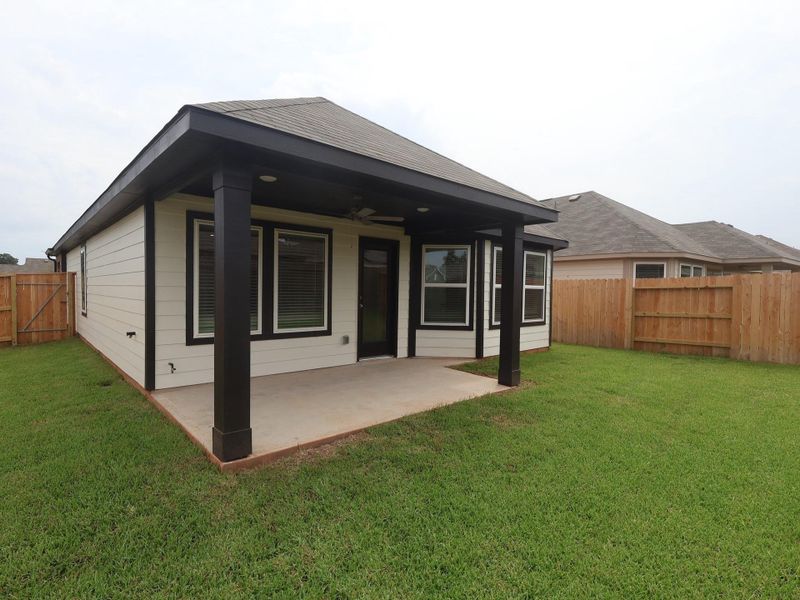 Front exterior of a new home in Moran Ranch, Willis, TX, highlighting curb appeal (Image 2). Front exterior of a new home in Moran Ranch, Willis, TX, highlighting curb appeal (Image 2).