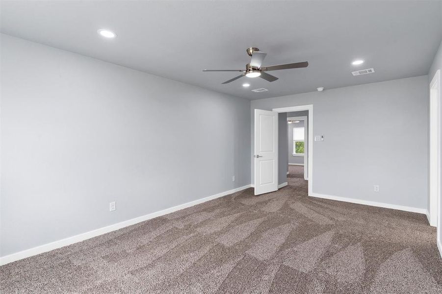 Unfurnished room featuring carpet, recessed lighting, and ceiling fan