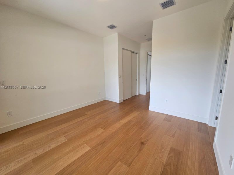 Spacious, unfurnished interior of a new home in , Miami (Image 25). Spacious, unfurnished interior of a new home in , Miami (Image 25).