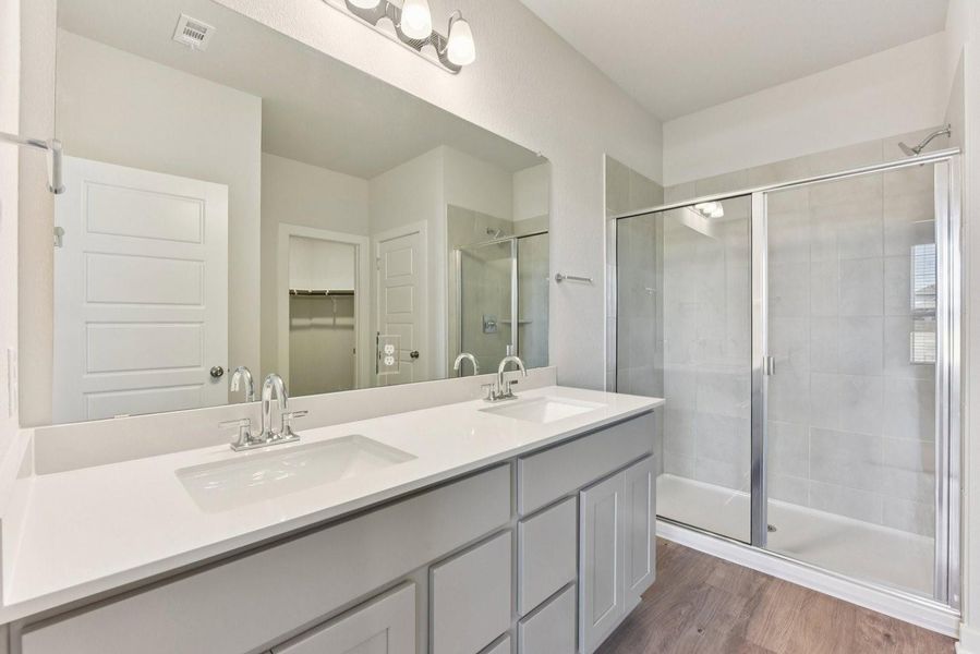 Furnished interior view inside a new home in Stallion Run, Buda (Image 7).