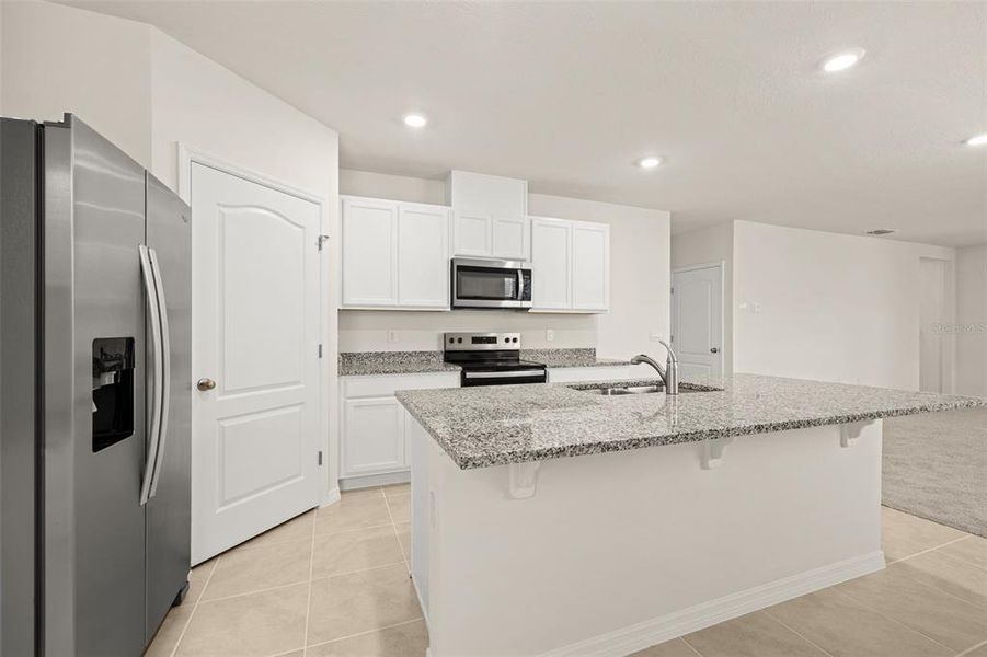 Furnished interior view inside a new home in , Kissimmee (Image 12). Furnished interior view inside a new home in , Kissimmee (Image 12).