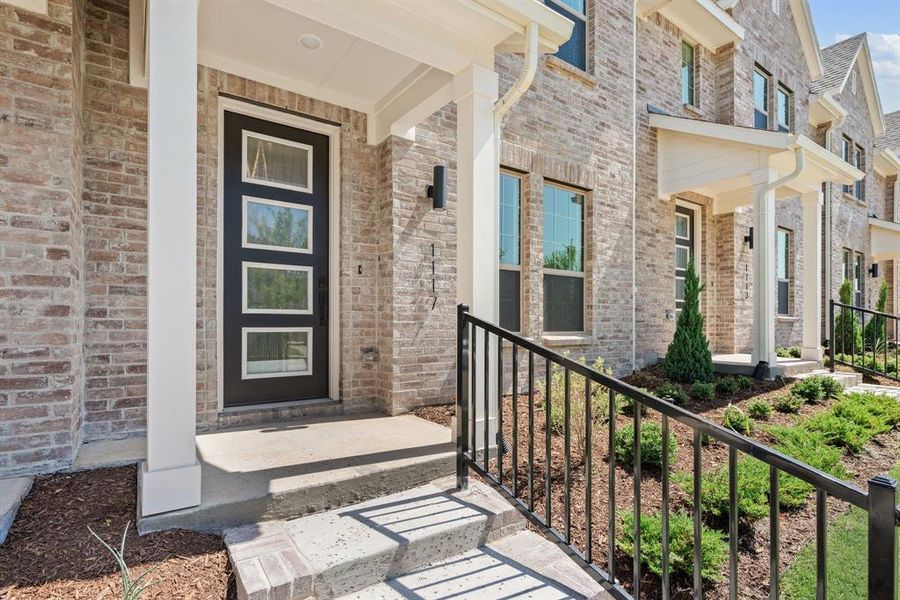 Beautiful brick paired with creamy white trim and striking dark accents create fantastic curb appeal in this dream home! Beautiful brick paired with creamy white trim and striking dark accents create fantastic curb appeal in this dream home!