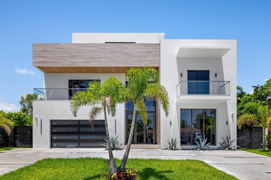 Front exterior of a new home in , Boca Raton, FL, highlighting curb appeal (Image 29). Front exterior of a new home in , Boca Raton, FL, highlighting curb appeal (Image 29).