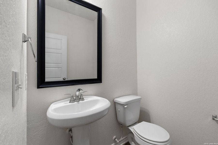 Furnished interior view inside a new home in Parklands, Schertz (Image 12).