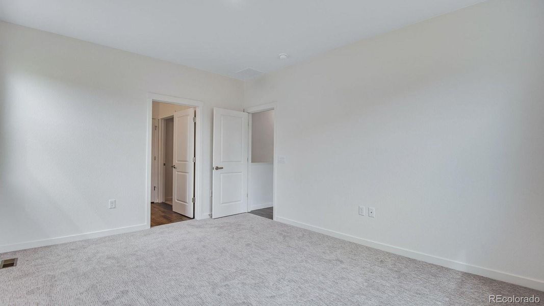 Spacious, unfurnished interior of a new home in Trails at Crowfoot, Parker (Image 39).