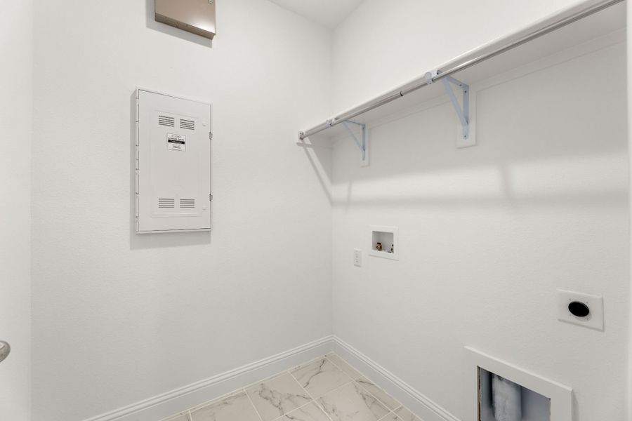 Representative furnished interior of a home built from the Tucker by UnionMain Homes in Elevon, Lavon (Image 11).