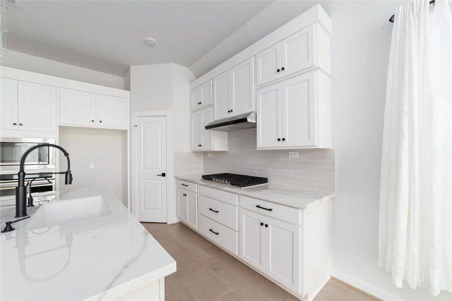 Furnished interior view inside a new home in Elyson 45' & 70', Katy (Image 11).