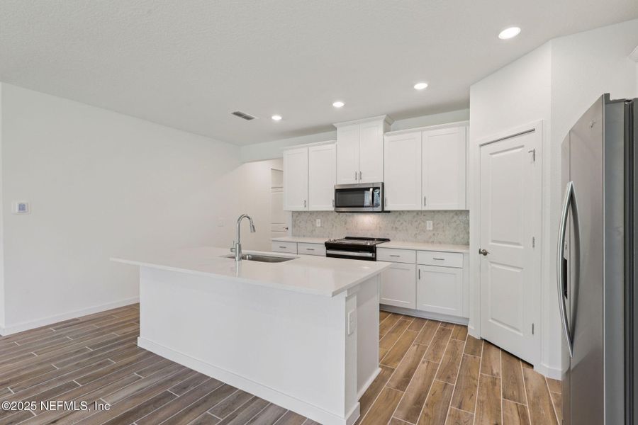 Furnished interior view inside a new home in Colbert Landings, Palm Coast (Image 5).
