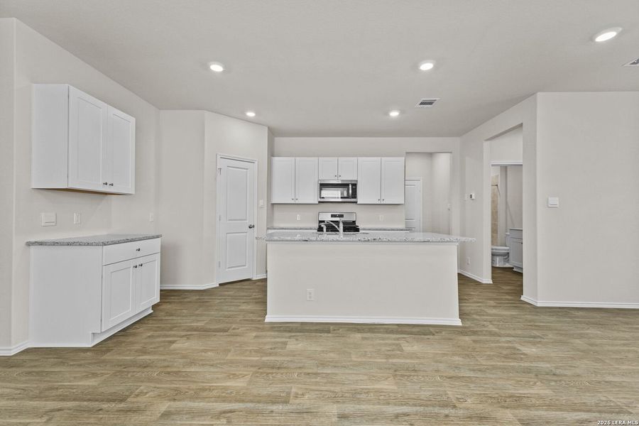 Furnished interior view inside a new home in Hunters Ranch, San Antonio (Image 8).