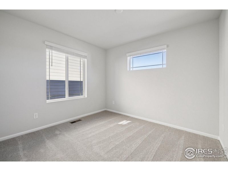 Spacious, unfurnished interior of a new home in The Villas Collection at Sterling Ranch, Littleton (Image 30).