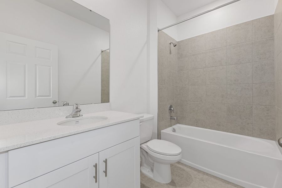 Furnished interior view inside a new home in Highfield at Twisted Oaks, Wildwood (Image 6).