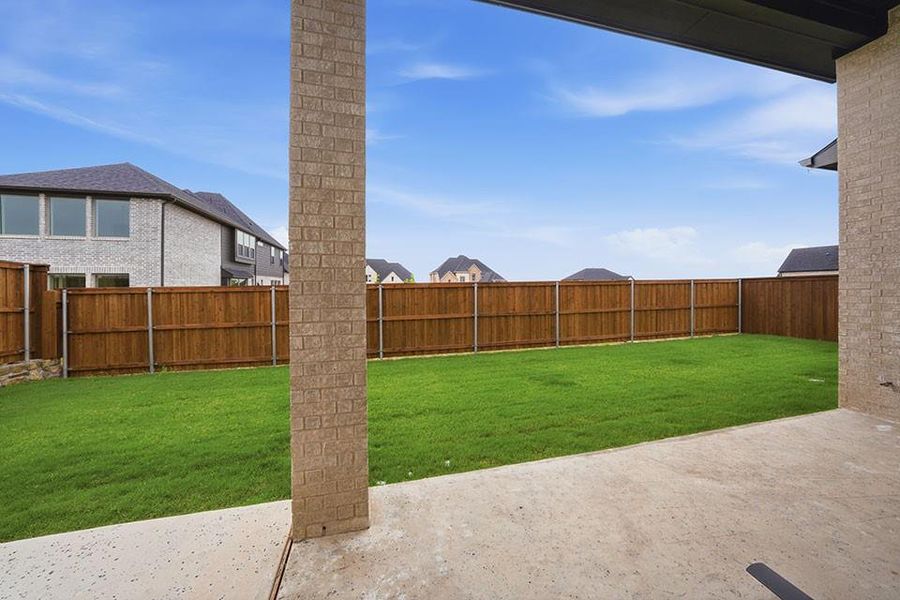 Exterior details and patio area of a home in The Homestead - 62', Rockwall (Image 3).