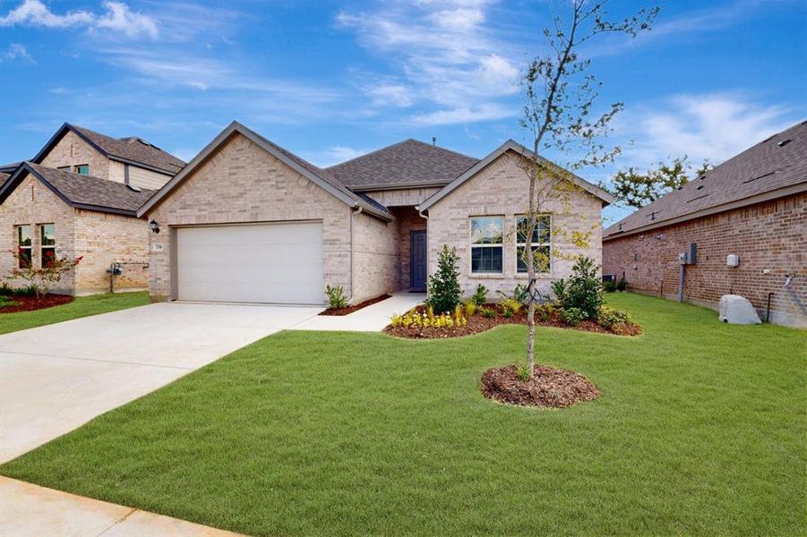 Front exterior of a new home in Kings Way, Denton, TX, highlighting curb appeal (Image 23). Front exterior of a new home in Kings Way, Denton, TX, highlighting curb appeal (Image 23).