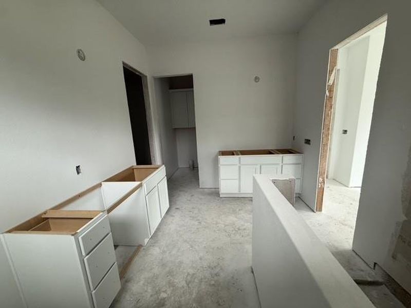 New construction with clean lines and a functional layout await your personal touches.