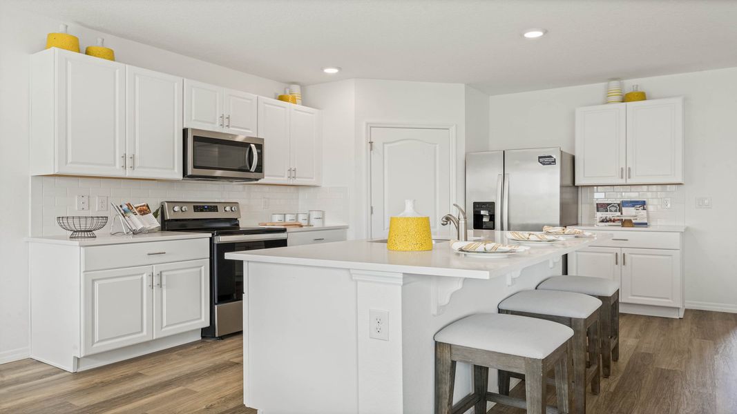Furnished interior view inside a new home in Magnolia at the Bluffs Phase 3, Freeport (Image 5).