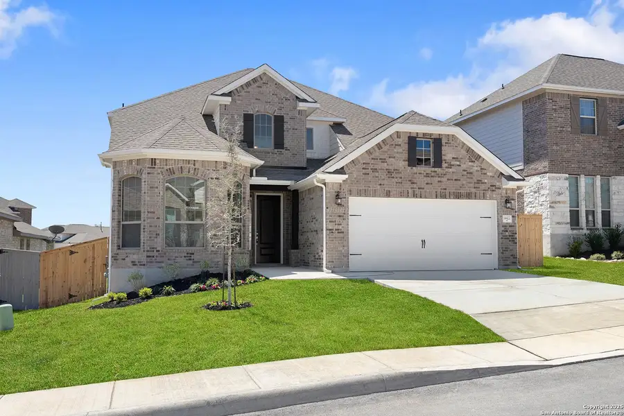 Front exterior of a new home in Ladera, San Antonio, TX, highlighting curb appeal (Image 1). Front exterior of a new home in Ladera, San Antonio, TX, highlighting curb appeal (Image 1).