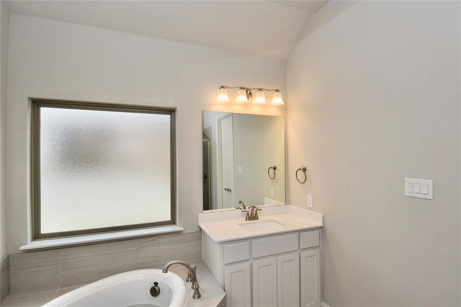 Furnished interior in a model home at Stone Henge II in Sanger (Image 10).