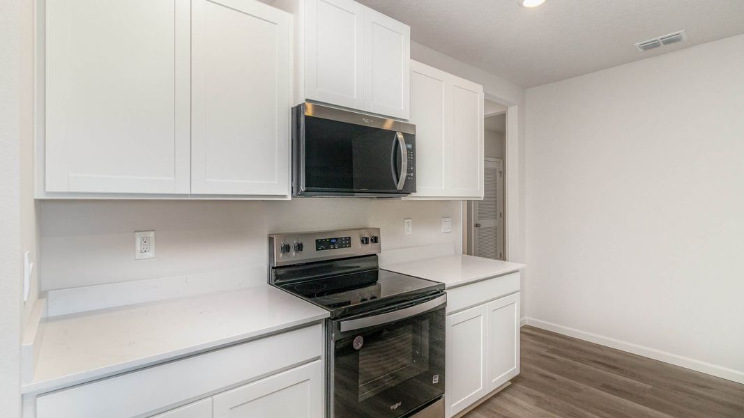 Furnished interior view inside a new home in Cypress Bay West, Palm Bay (Image 6).