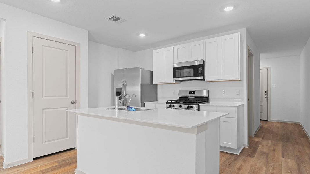 Furnished interior view inside a new home in Watermark, Alvin (Image 2).