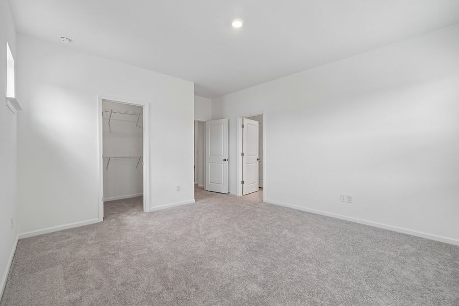 Spacious, unfurnished interior of a new home in Terraces at the Exchange, Indian Land (Image 40).