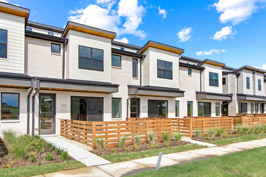 Front exterior of a new home in Ten Mile Creek, Celina, TX, highlighting curb appeal (Image 2). Front exterior of a new home in Ten Mile Creek, Celina, TX, highlighting curb appeal (Image 2).