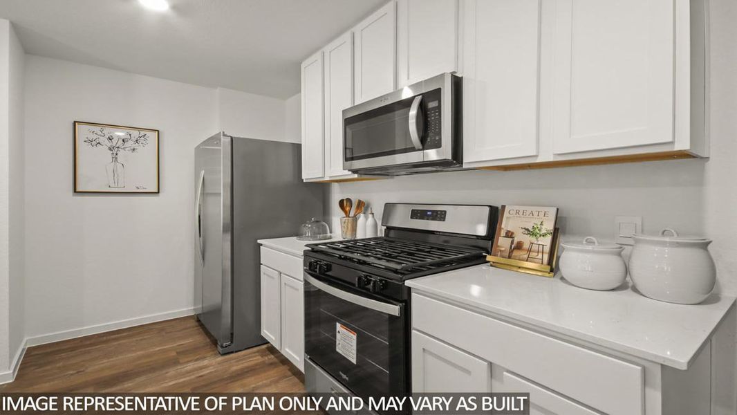 Furnished interior view inside a new home in Sunterra, Katy (Image 11).