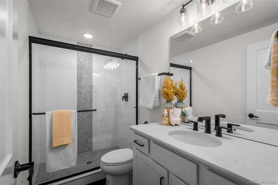 Furnished interior view inside a new home in Wolf Ranch - Enclave Collection, Colorado Springs (Image 18).