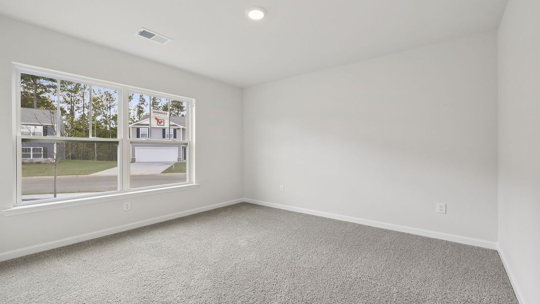 Spacious, unfurnished interior of a new home in Bentley Park, Greenwood (Image 14).