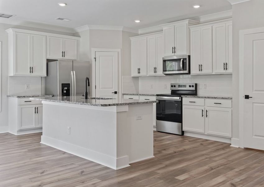 The kitchen has granite countertops