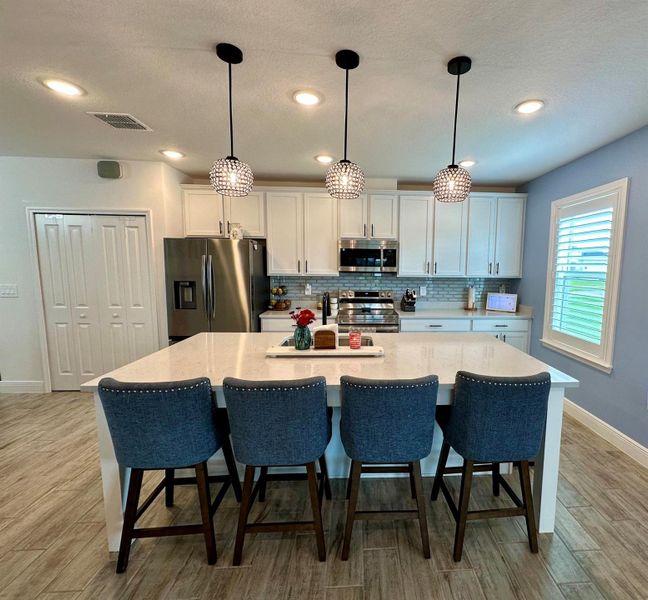 Furnished interior view inside a new home in , Port St. Lucie (Image 7).