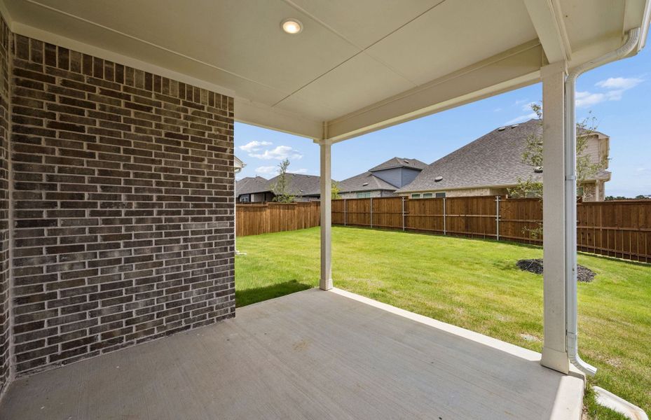 Exterior details and patio area of a home in Creekview Meadows, Pilot Point (Image 2). Exterior details and patio area of a home in Creekview Meadows, Pilot Point (Image 2).