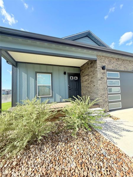 Expansive front patio, perfect for enjoying morning coffee