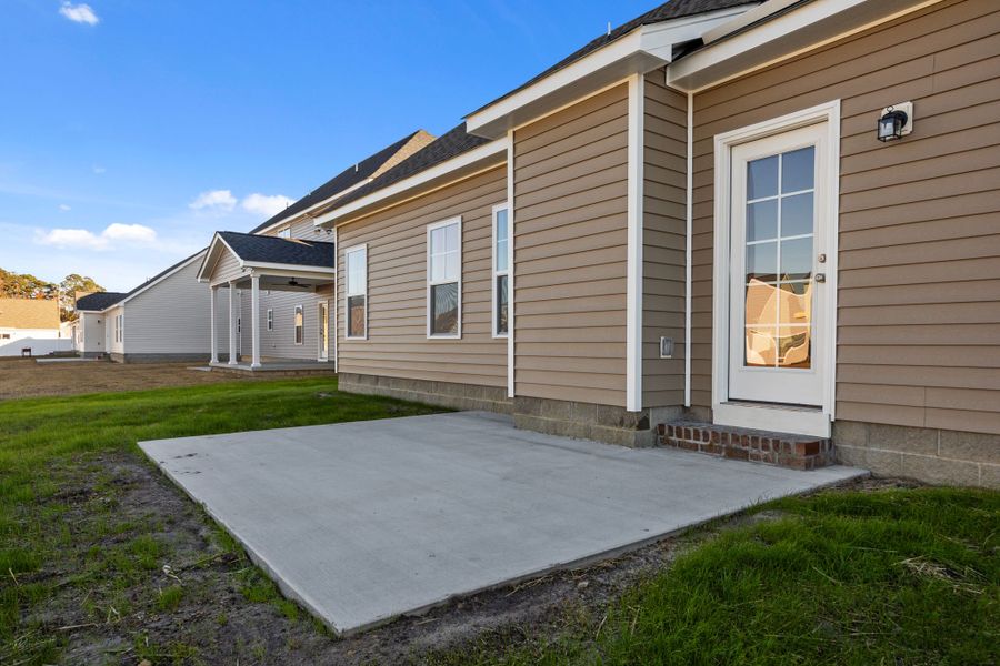 Exterior details and patio area of a home in Arbor Hills South II, Greenville (Image 28).
