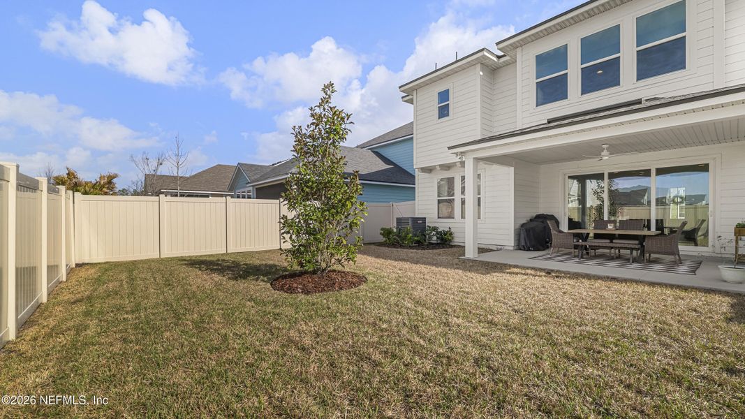 Exterior details and patio area of a home in Settler's Landing at Nocatee, Ponte Vedra (Image 3).