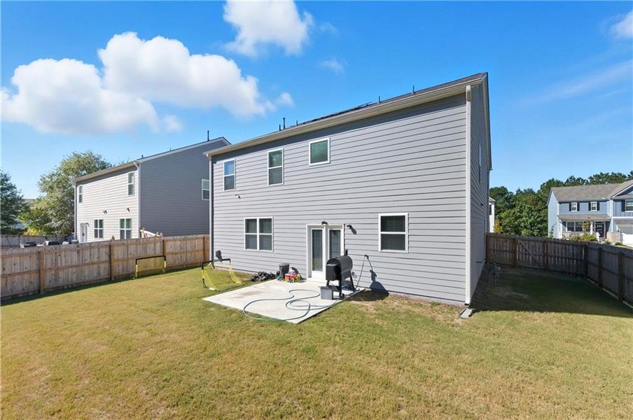 Exterior details and patio area of a home in Oakhurst Glen, Fairburn (Image 4). Exterior details and patio area of a home in Oakhurst Glen, Fairburn (Image 4).