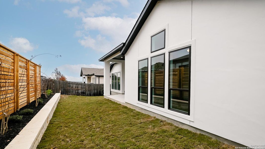 Exterior details and patio area of a home in Veramendi 60', New Braunfels (Image 3).