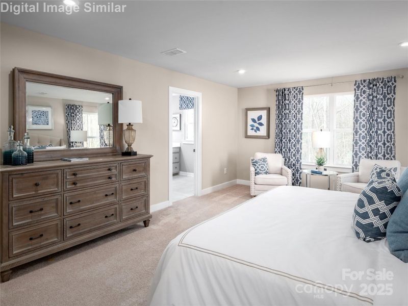 Plenty of room to relax and recharge — this bedroom offers space to move, unwind, and make it your own.