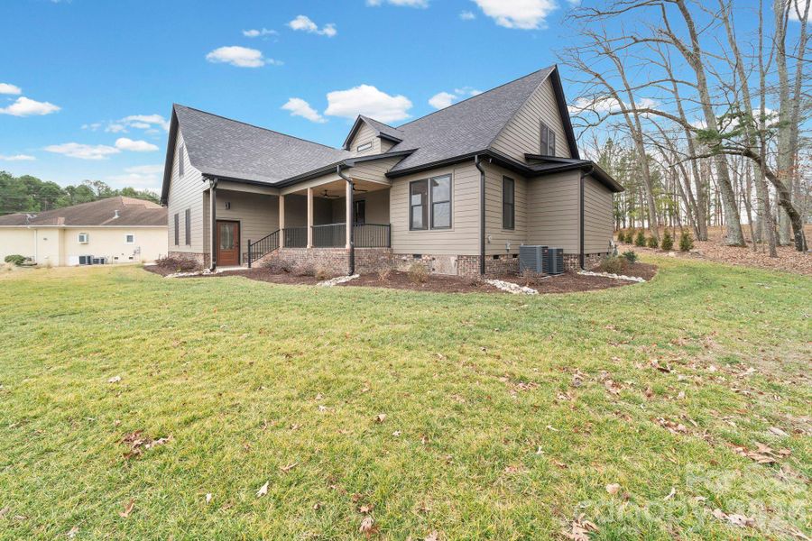 Rear View - Covered porch with access to garage