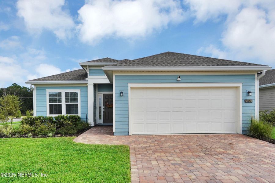 Front exterior of a new home in , Jacksonville, FL, highlighting curb appeal (Image 23).