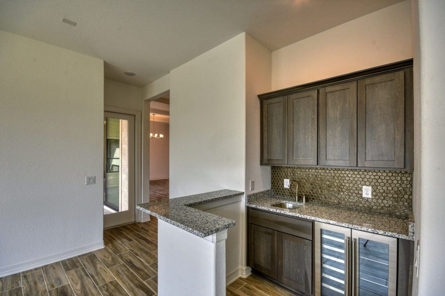 Furnished interior view inside a new home in El Sonido at Campanas, San Antonio (Image 7).