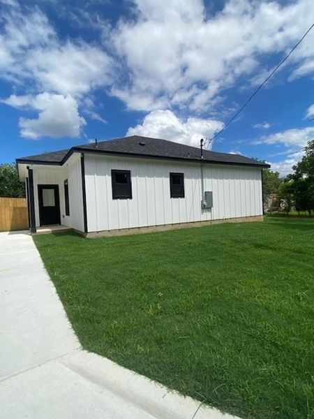 A newly constructed residence showcasing crisp white siding and a well-kept lawn, ready for personalization. A newly constructed residence showcasing crisp white siding and a well-kept lawn, ready for personalization.