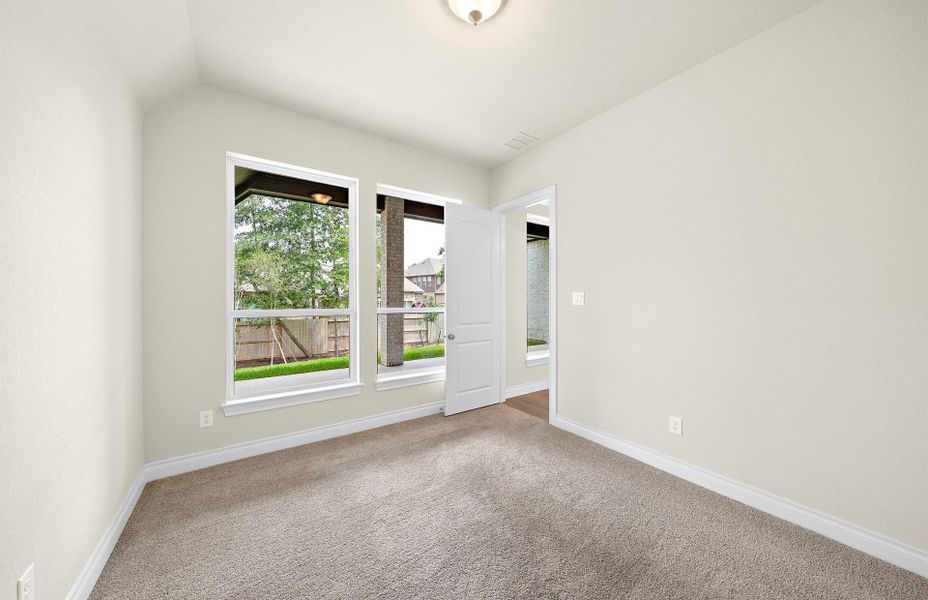 Spacious, unfurnished interior of a new home in The Woodlands Hills 65′, Willis (Image 24).