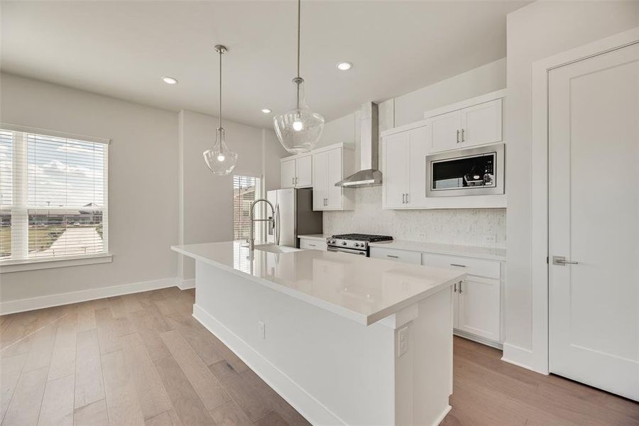 Furnished interior view inside a new home in Collin Creek, Plano (Image 6).