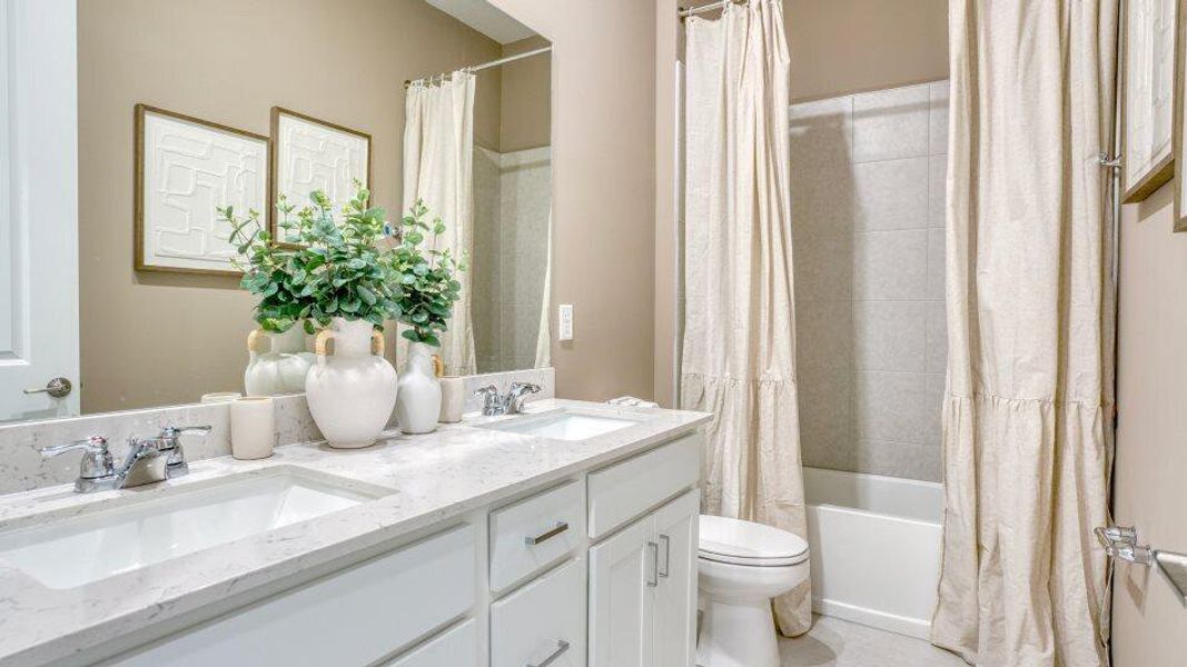 Furnished interior view inside a new home in Veranda Preserve: The Grand East, Port St. Lucie (Image 6).