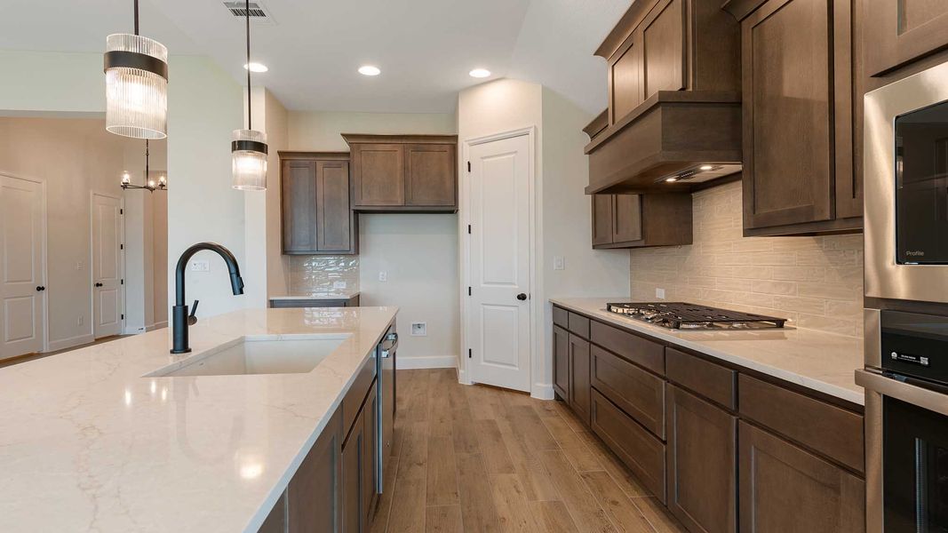 Furnished interior view inside a new home in Meraki, Forney (Image 10).